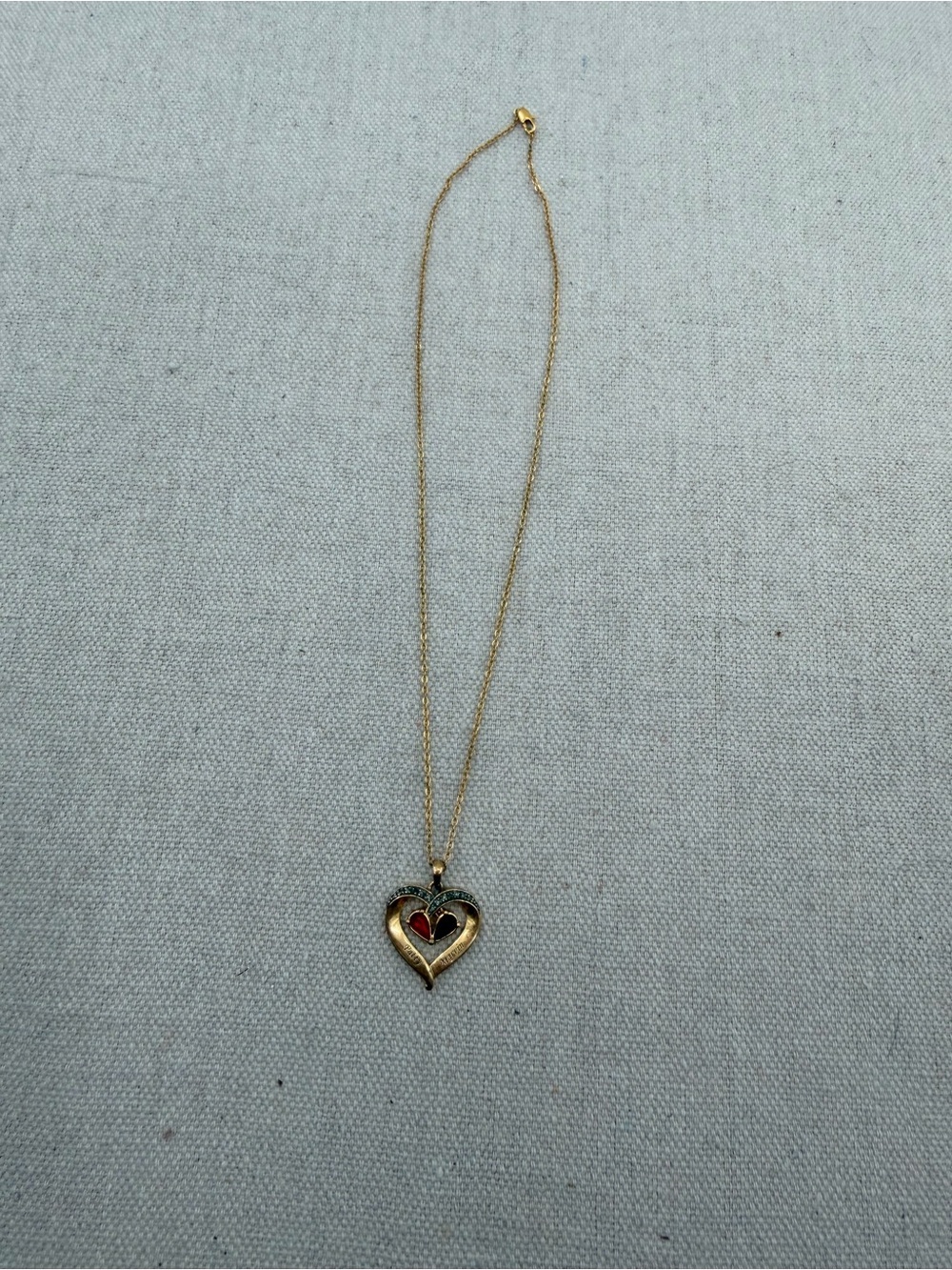 Gold Heart Pendant Necklace with Red Accent